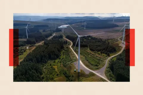 Getty Images Wind turbines dot the landscape at a windfarm in Treorchy, Wales